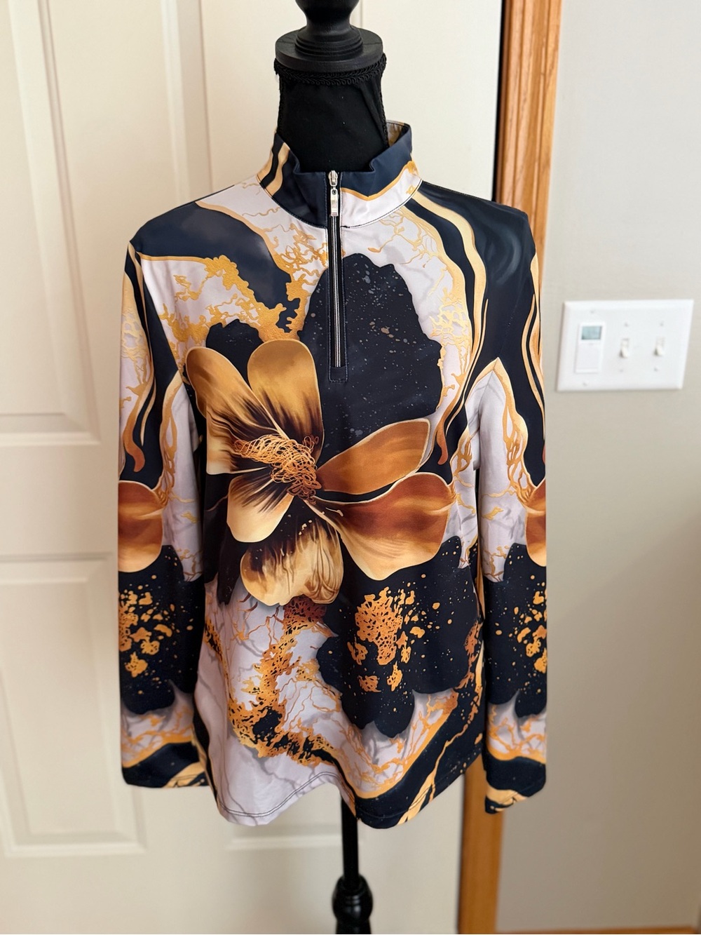 Acegolfs Botanical energy black gold floral performance quarter zip shirt. Large